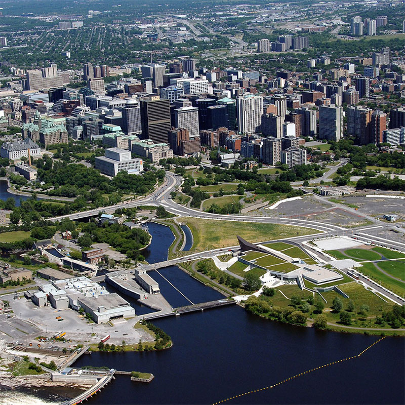 An aerial image of downtown Ottawa showing buildings and canal